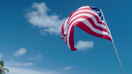 USA flag. Independence day. Flag USA waving in sky on independence or memorial day. Memorial day. American flag for memorial day or 4th of July. American flag patriotic independence symbol - Powered by Adobe