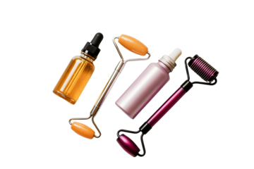 Skincare tools and beauty products arranged on a dark background isolated on transparent background