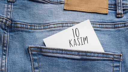 Memory and Patriotism: A symbolic reminder of November 10 ("10 Kasım") hidden in the back pocket of light jeans, ready to commemorate an important historical date