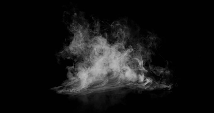 Super Slow Motion of White Surface Smoke Texture Isolated on Black Background. Filmed on High Speed Cinema Camera, 500fps. VFX element for overlay.