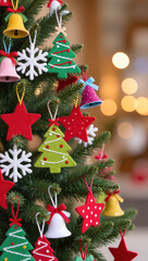 Christmas tree decorated with colorful handmade felt ornaments including stars, snowflakes, trees and bells in festive cozy holiday setting with warm lights.