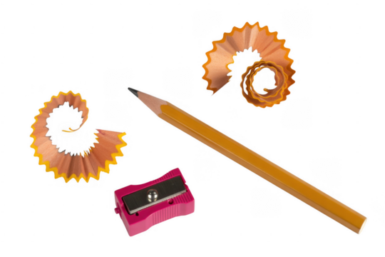 Yellow pencil shavings and sharpener isolated on a transparent background