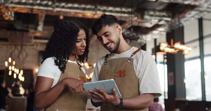 Conversation, servers or reading with tablet in restaurant, check digital menu changes or booking app update. Review loyalty program, talk or people with tech for online payment, reservation or smile