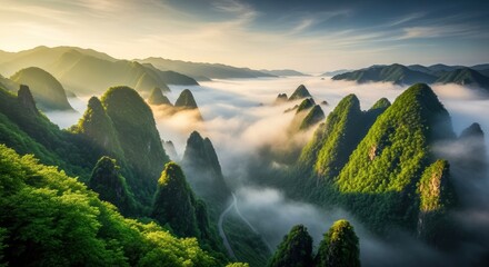 Majestic karst mountains pierce through a misty cloud inversion at sunrise