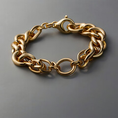 A close-up studio shot presents a dazzling gold chain bracelet. The chain, fashioned from intricately linked gold pieces, catches the light.