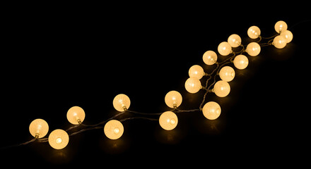Warm white globe string lights on black background