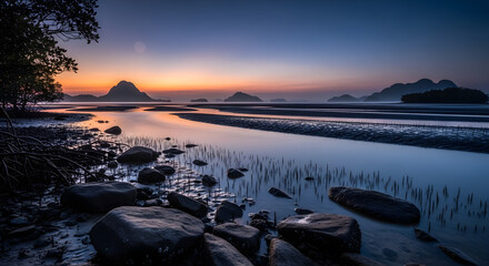 Serene Coastal Landscape at Dawn with Gentle Waves and Distant Islands
