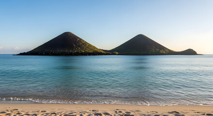 Two Majestic Volcanic Cones Rise from the Turquoise Waters of a Tropical Island Paradise