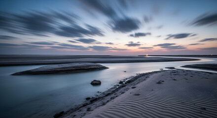 Serene Coastal Landscape at Twilight: Long Exposure Captures Ethereal Sky and Reflective Waterways