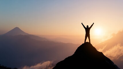 Silhouette person raising hands in victory pose on mountain peak