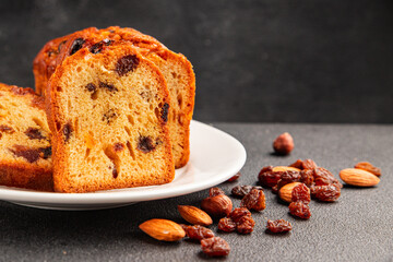 Fruit cake sweet pastry fruitcake dessert dried fruits, nuts traditional baked goods natural product tasty snack fresh delicious gourmet food background on the table rustic top view copy space