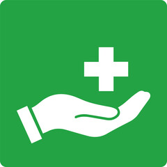 hand holding medical cross icon on green background representing healthcare support and assistance