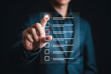 Businessman Tapping Digital Checklist: Task Completion, Survey, or Successful Project