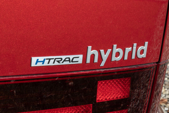Hyundai Santa Fe Hybrid SEL AWD SUV with HTRAC HYBRID logo. The Hyundai Santa Fe has a 1.6T Hybrid powertrain. MY:2026