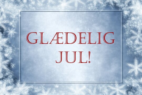Christmas card in dannish language "Merry Christmas!" in light blue color with snowflakes around