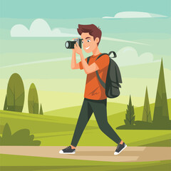 Young man with backpack taking photo in green landscape