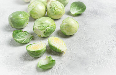 fresh Brussels sprouts, raw, top view, on a gray table, no people,