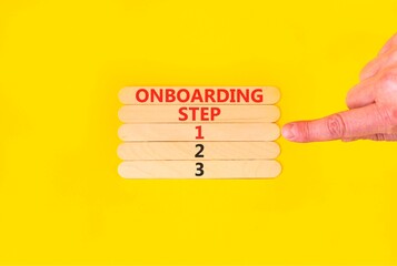 Time to step 1 onboarding symbol. Concept words Onboarding step 1 on beautiful wooden block. Businessman's hand. Beautiful yellow background. Business success step 1 onboarding concept. Copy space.