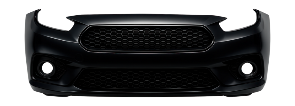 Front bumper featuring fog light slots and a honeycomb grille design.