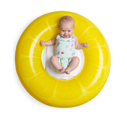 Cute little baby on inflatable ring against white background, top view
