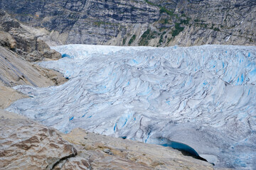 Textured bluish white ice field of the Folgefonna glacier in southern Norway