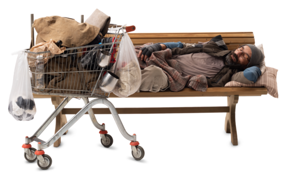 A homeless man lying on a wooden bench with shopping cart, isolated on white