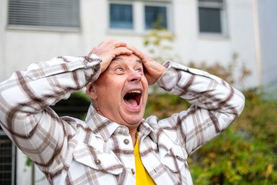 close-up man’s face screaming with wide-open mouth, intense expression, Person shouting in pain, Human face expressing agony and suffering, capturing raw emotion, stress and pressure, pure emotion