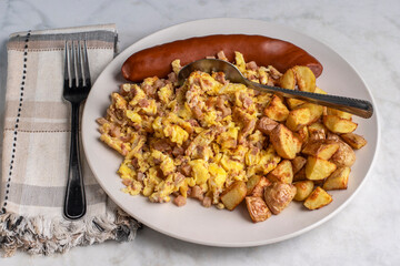 scramble eggs and corn beef hash  with  smoked sausage