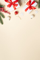 Christmas present, balls and fir tree branches.