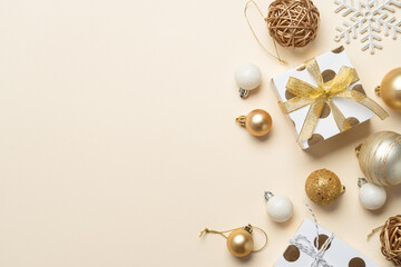 Christmas present and balls, golden decorations.