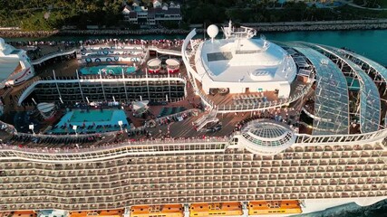 Aerial top view of cruise in summer vacation. Cruise ship tour and travel at sea. Aerial luxury liner voyage. Ship top view. Luxury liner resort. Cruise ship voyage. Entertainment deck