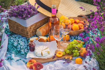 Wine in a lavender field. Selective focus.
