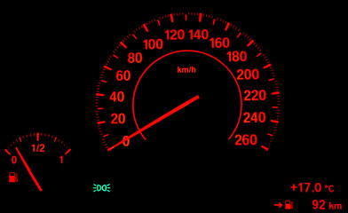 Red car speedometer glowing in the dark, showing speed scale in km h on a black background.