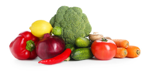 Pile of different fresh raw vegetables and lemon isolated on white