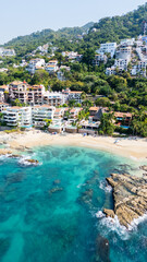Puerto vallarta conchas chinas beach showing tropical coast and resorts, mexico