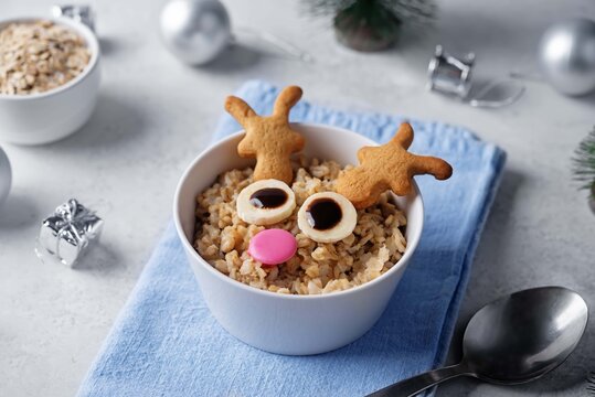 Oatmeal in a bowl in the form of reindeer for Christmas holidays