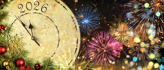 Happy New 2026 Year. Clock, Christmas decor, bokeh lights and fireworks on card