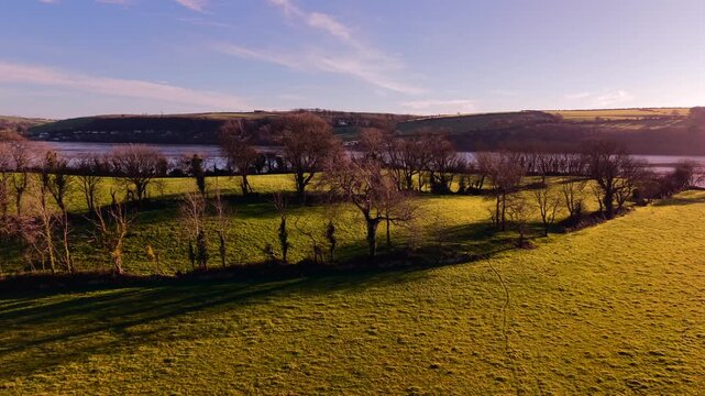 Drone: Sunset over meadows and river, Midleton, Cork, Ireland
