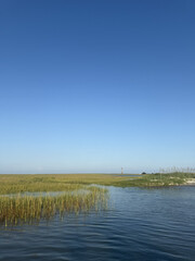 landscape with river and blue sky