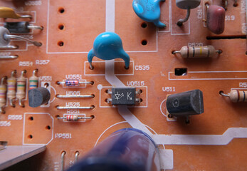 Opto-isolator component on an industrial electronic board that provides communication between the two circuits. 