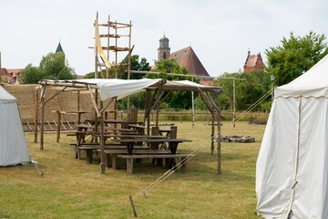 Medieval Camp Setup with Wooden Pavilion and Tents in Dinkelsb&uuml;hl, Germany