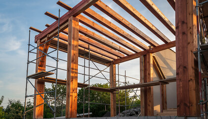 Aesthetic wood frame construction showcases natural building and sustainable design, creating a contemporary home with eco-friendly materials and timber framing