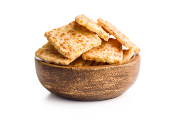 Crunchy salted crackers in bowl  isolated on white background.