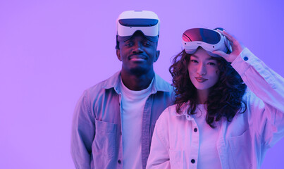 Diverse young adults multiethnic team experiencing virtual reality with vr headsets