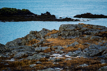 Rocky coastal terrain with ocean in background, Akranes, Iceland