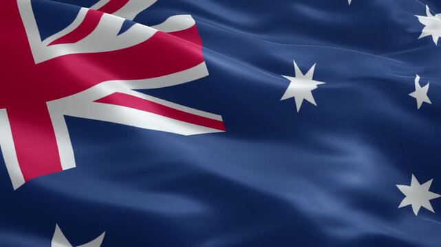 Dynamic Australian flag waving proudly, a symbol of national pride and identity, representing unity and patriotism in a vibrant display - Powered by Adobe