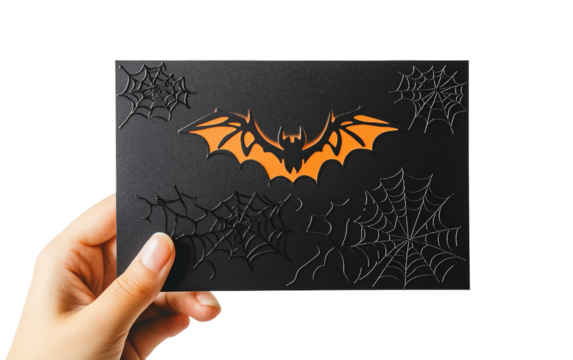 Festive moment with hand displaying Halloween invitation for celebration and fun isolated on transparent background PNG