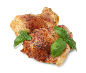 Tasty roasted chicken thighs with basil isolated on white