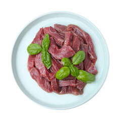 Pieces of raw beef meat and basil isolated on white, top view