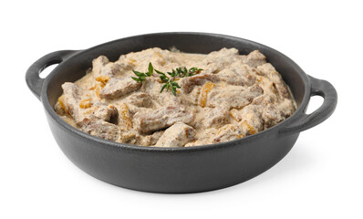 Tasty beef Stroganoff with thyme in baking pan isolated on white